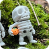 Skeleton with Pumpkin