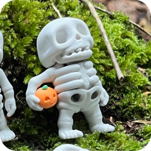 Skeleton with Pumpkin